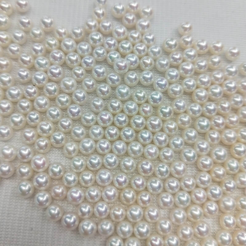 Bulk lot of high luster natural white round loose freshwater pearls for jewelry designers