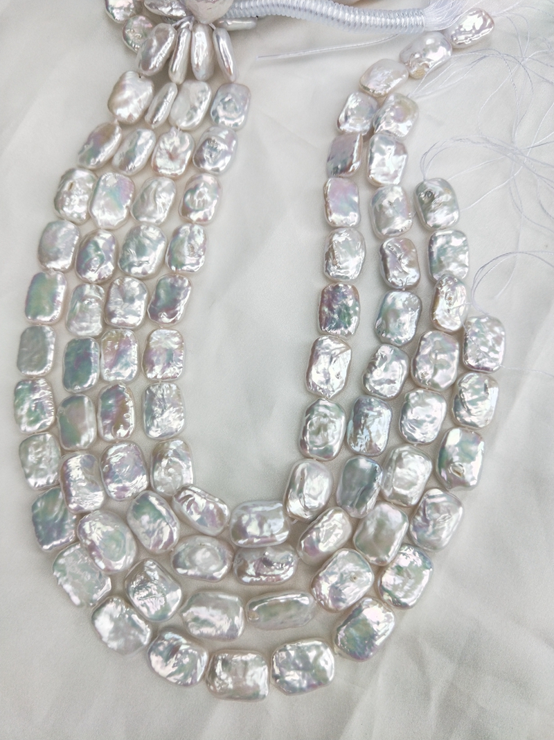 bright white cultured nucleated freshwater rectangular keishi pearls - Image 3