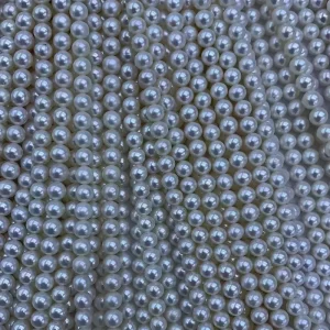 Bulk stock of genuine freshwater pearl strands from B2B supplier for tiny pearl necklace mass production