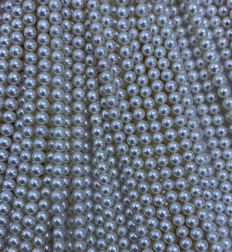 Bulk stock of genuine freshwater pearl strands from B2B supplier for tiny pearl necklace mass production