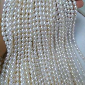 7-8mm white rice shape freshwater pearl strands