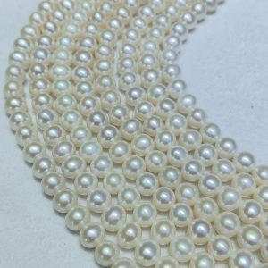 Premium white round freshwater pearl strands 9-10mm