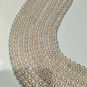 High luster round edison pearls with smooth surface