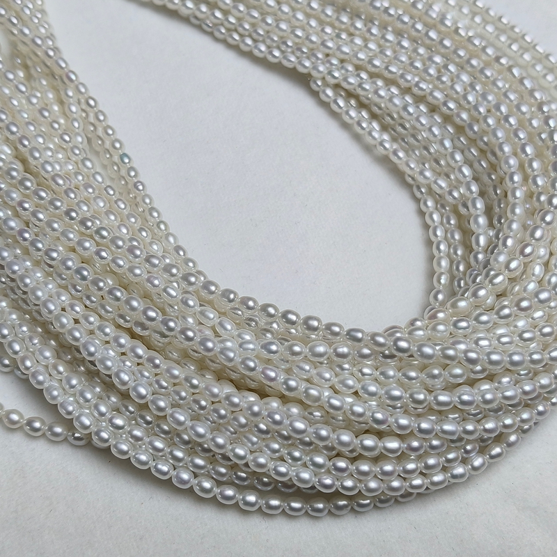 Smooth surface rice pearl strands for jewelry making projects