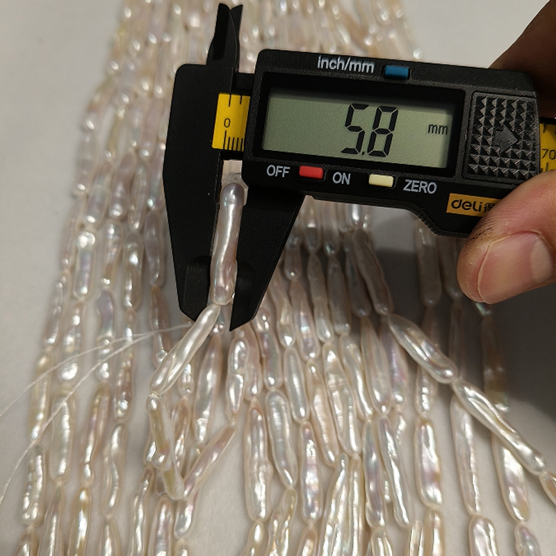 Natural cultured stick pearl strands with cylindrical shape for necklace production