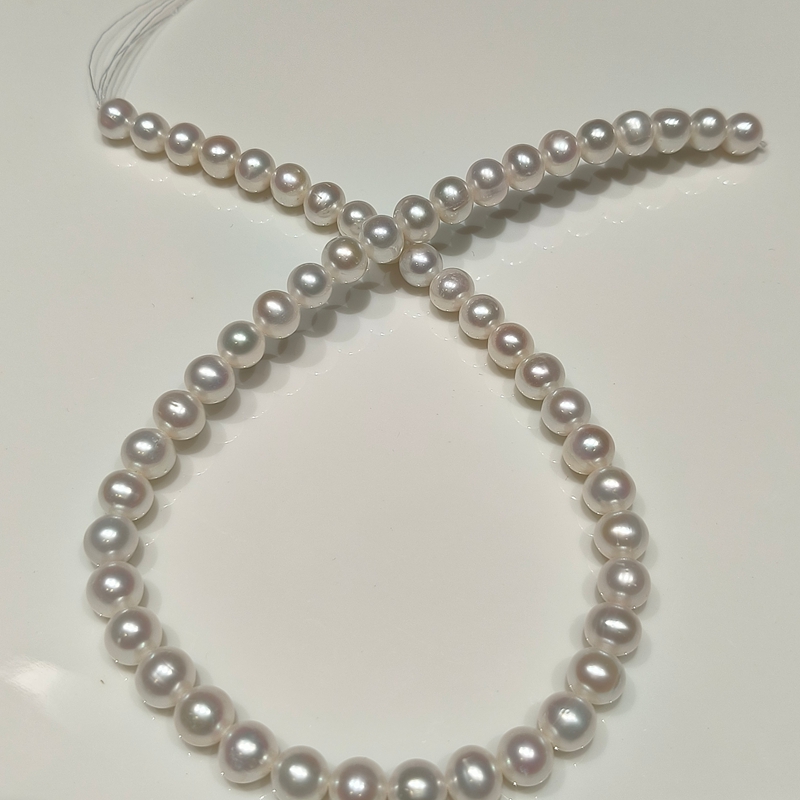 size measurement of near-round pearl strands