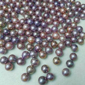 Purple Edison freshwater pearls with high luster and smooth surface