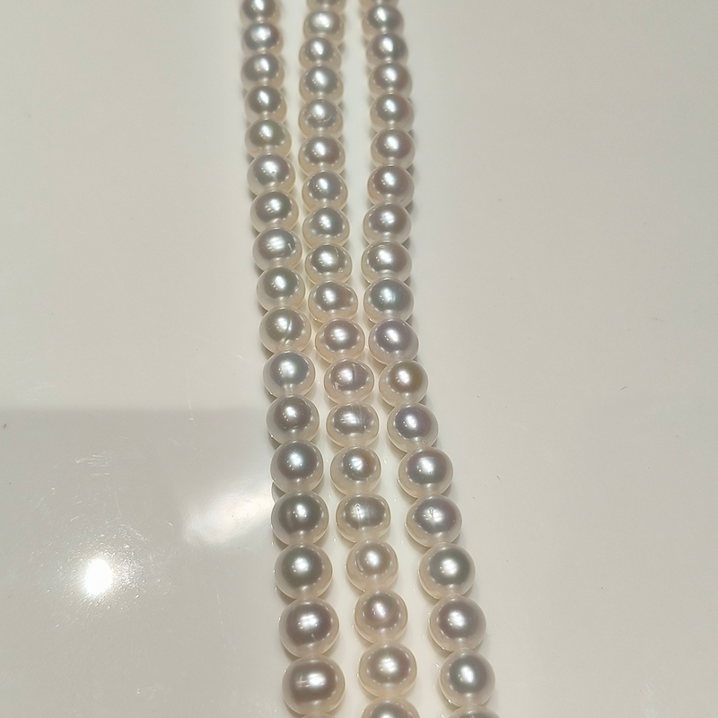 white near-round freshwater pearl strands 8-9mm