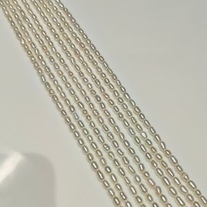 white seed pearl strands 2.5-3mm
