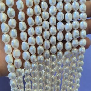 Wholesale AAA grade white nugget freshwater pearl strands for jewelry making