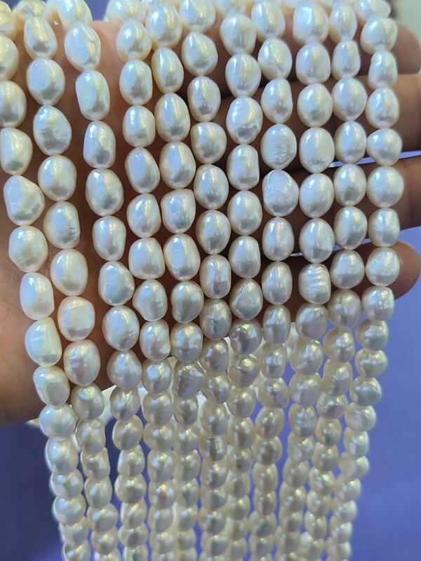 Wholesale AAA grade white nugget freshwater pearl strands for jewelry making