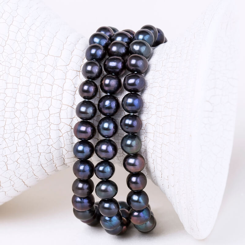 Peacock black freshwater cultured pearl strands in bulk, factory direct wholesale pearl strings.