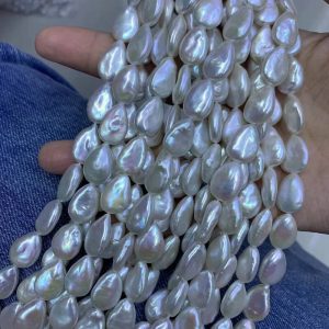 A matched pair of high luster flat teardrop baroque freshwater pearls for jewelry makers.