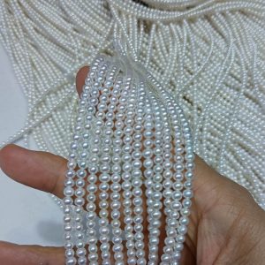 Fully drilled 4mm to 5mm small freshwater pearl strands for independent jewelry designers.