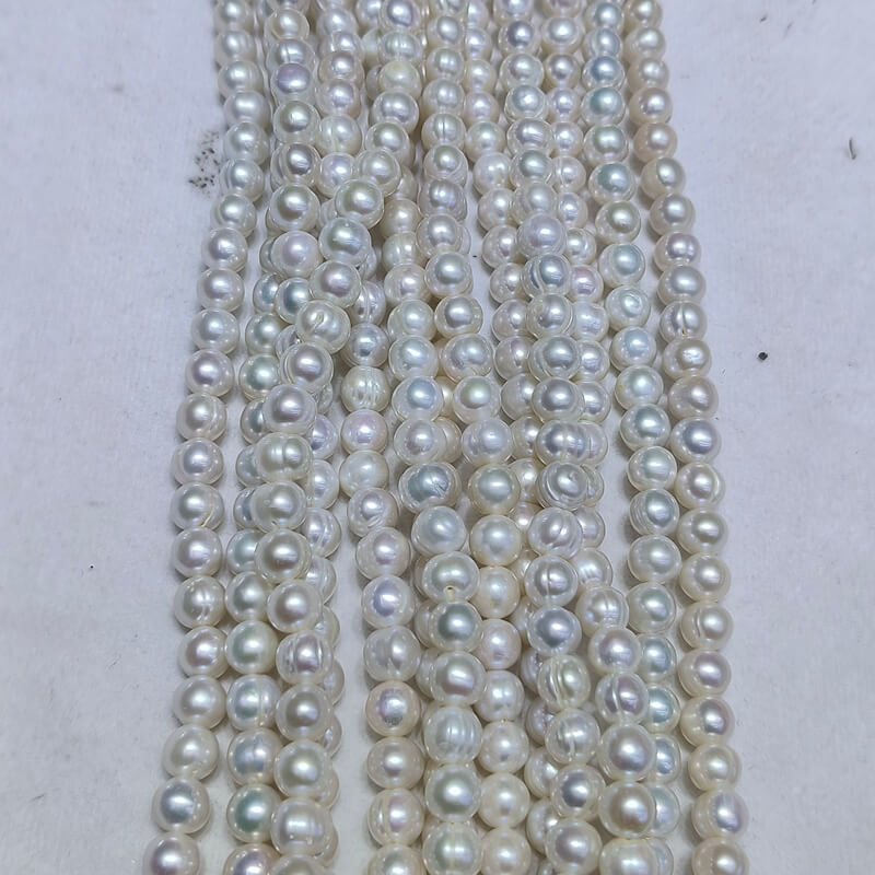 High luster A grade textured freshwater cultured pearls bulk supply for independent jewelry designers