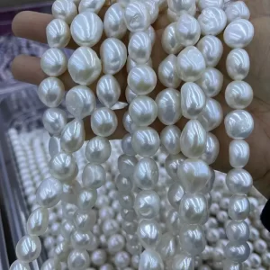 Genuine loose cream white baroque pearls strands for high-end necklace and jewelry production.