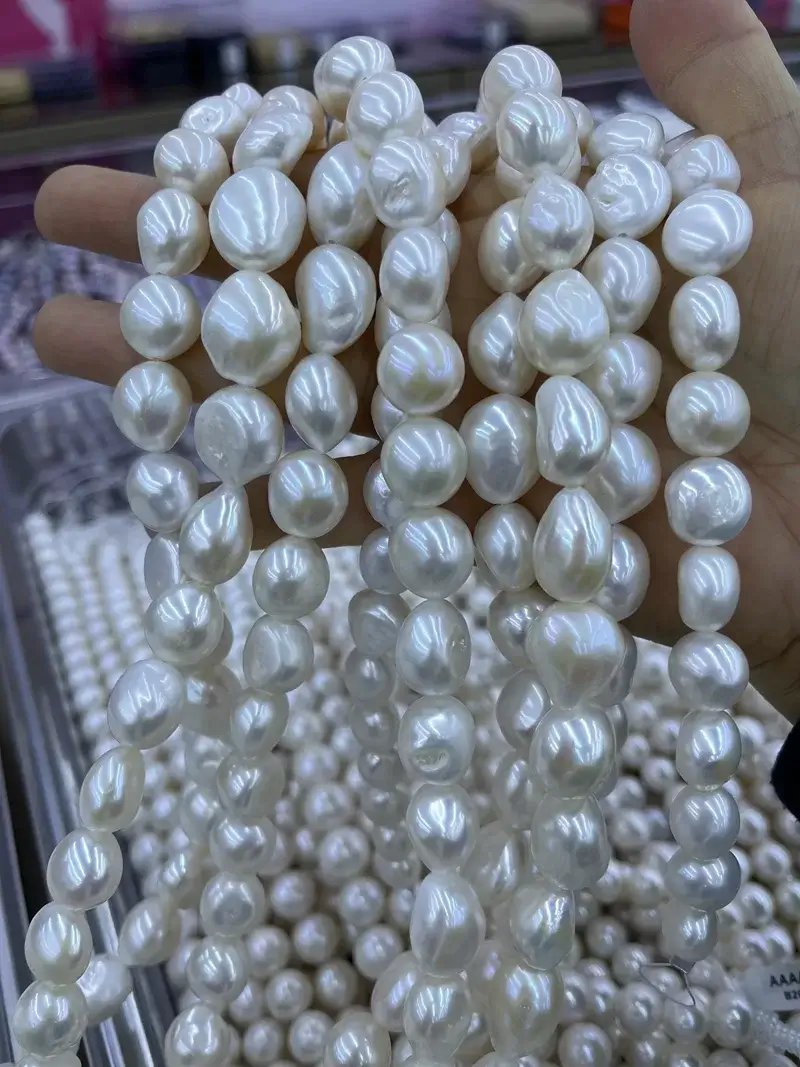 Genuine loose cream white baroque pearls strands for high-end necklace and jewelry production.