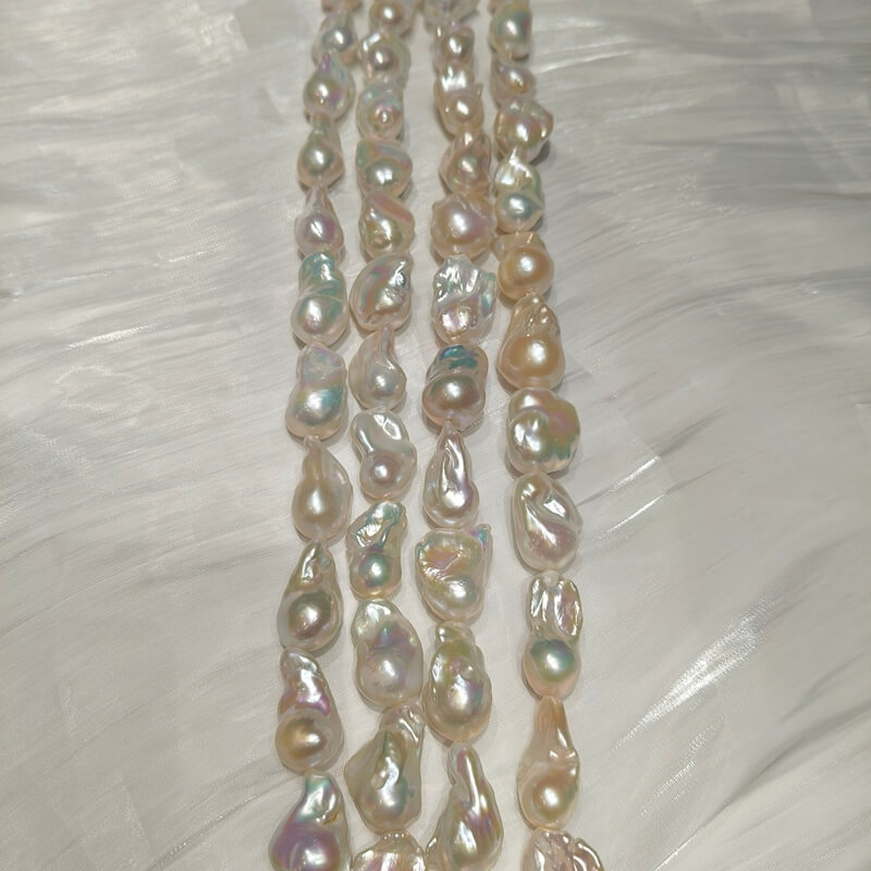 Bulk inventory of high luster fireball shape baroque pearls from professional B2B wholesale supplier