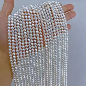 A 16-inch strand of 5mm natural white freshwater round pearls, loose and ready for jewelry making.