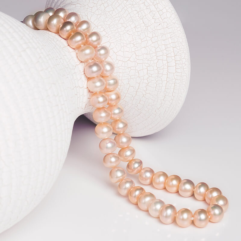 High luster metallic pink and lavender freshwater cultured pearl strands for jewelry making suppliers.