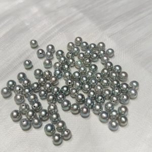 Wholesale loose gray half drilled round pearls ready to mount on sterling silver or gold earring posts.
