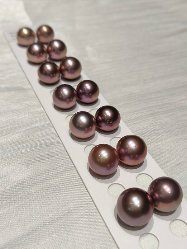 Premium 13mm metallic purple freshwater Edison loose pearls offering high value for custom jewelry making.