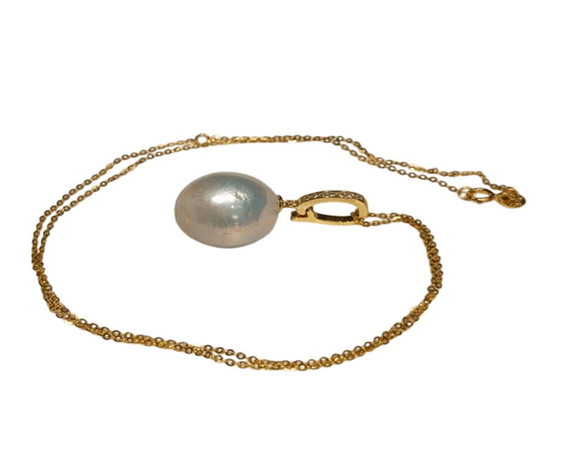 Bulk supply of large fireball baroque pearl necklace featuring a sparkling micro-pavé S925 silver interlocking clasp for B2B wholesale jewelry buyers.