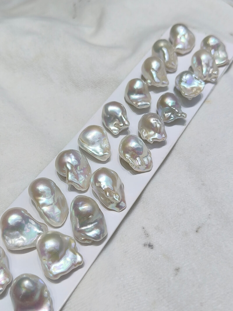 pairs of baroque fireball pearls with intense rainbow iridescence for high-end jewelry design.