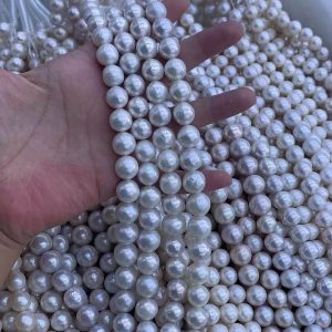High cost-performance off-round freshwater pearl strands featuring natural growth patterns and mirror shine.