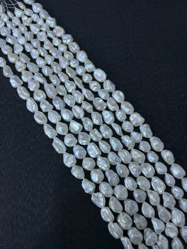 Bulk white freshwater loose Keshi pearl strands ready for necklace making, direct wholesale pricing