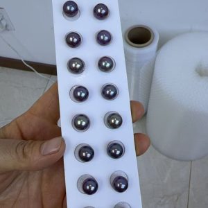 Wholesale tray of matched pairs of metallic peacock blue and violet Edison pearls for earrings