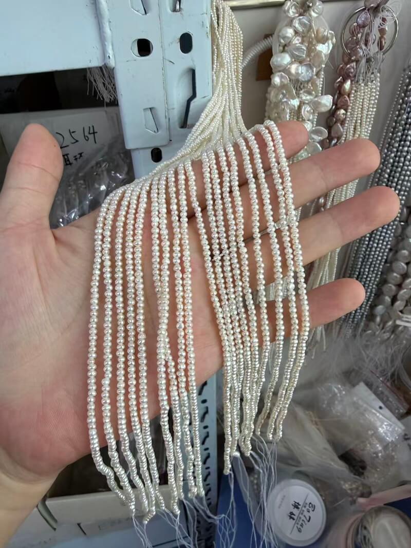 Bulk supply of natural white 2-2.5mm seed pearl necklace loose strands for DIY jewelry making