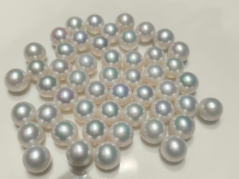 Digital measurement showing a 9.8mm round white Edison loose pearl stone, showcasing an eye-clean surface profile engineered for luxury solitaire ring mountings.